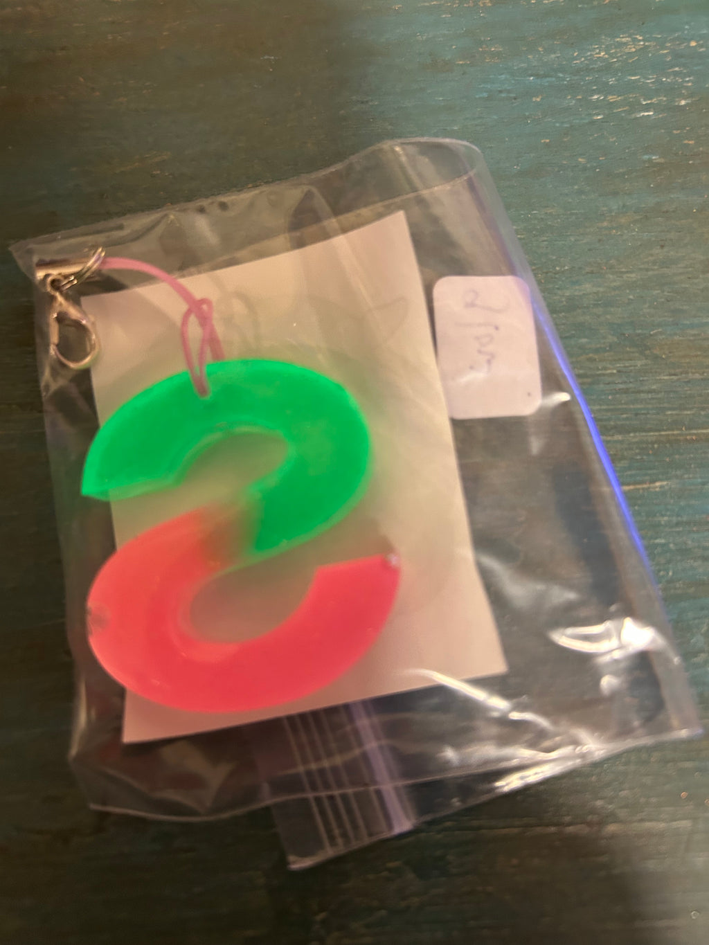 Letter charms/key chains/ bag clips (style color varies) some glow some don’t