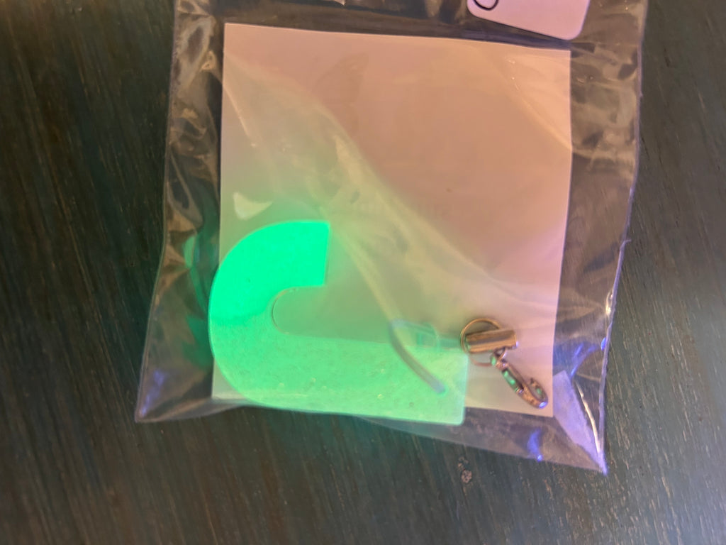 Letter charms/key chains/ bag clips (style color varies) some glow some don’t