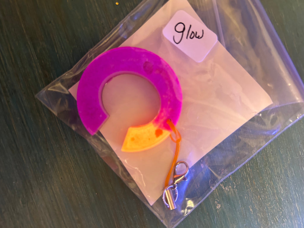 Letter charms/key chains/ bag clips (style color varies) some glow some don’t