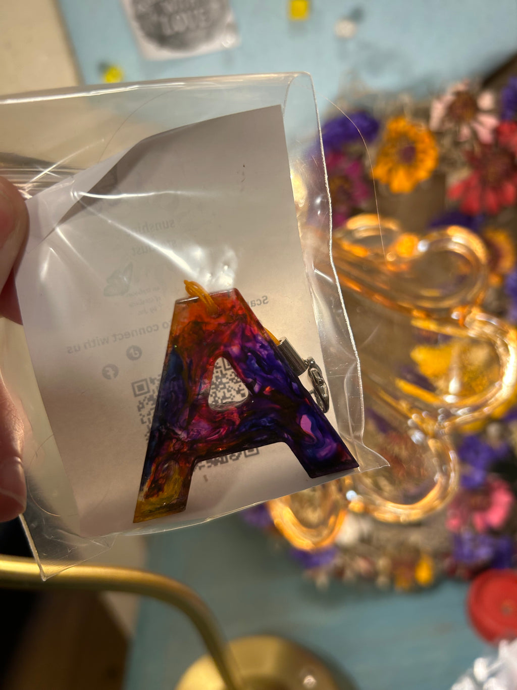 Letter charms/key chains/ bag clips (style color varies) some glow some don’t