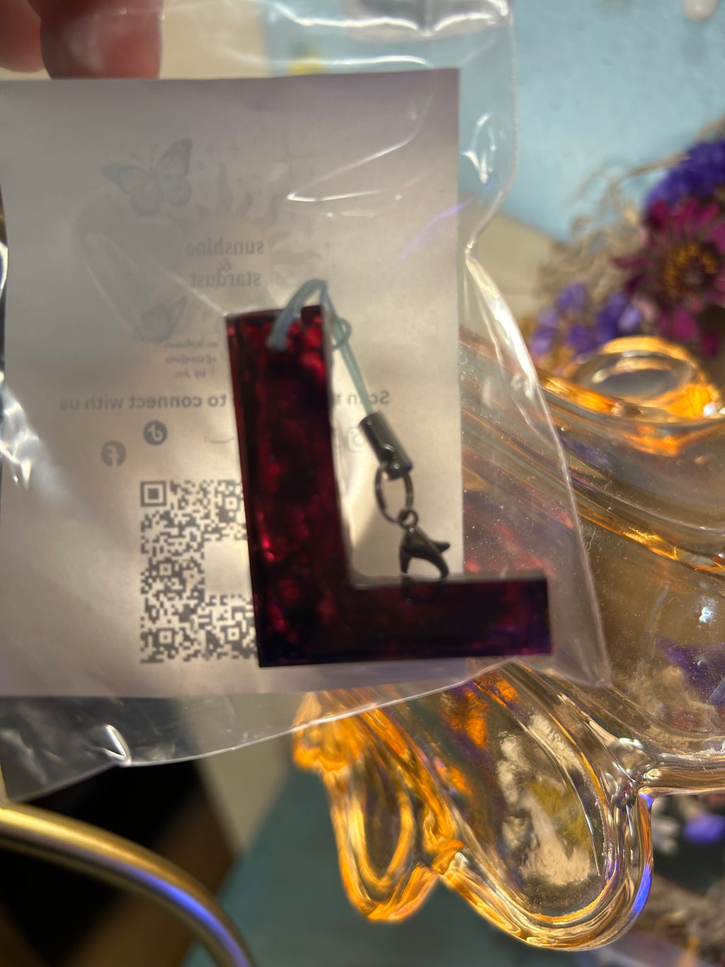 Letter charms/key chains/ bag clips (style color varies) some glow some don’t