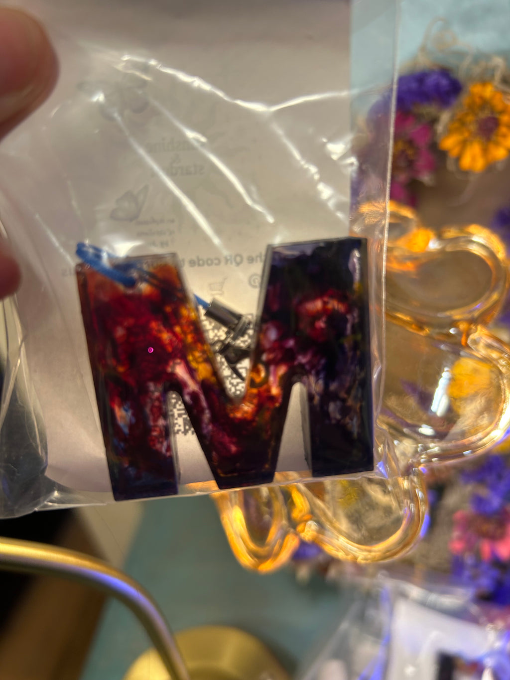 Letter charms/key chains/ bag clips (style color varies) some glow some don’t