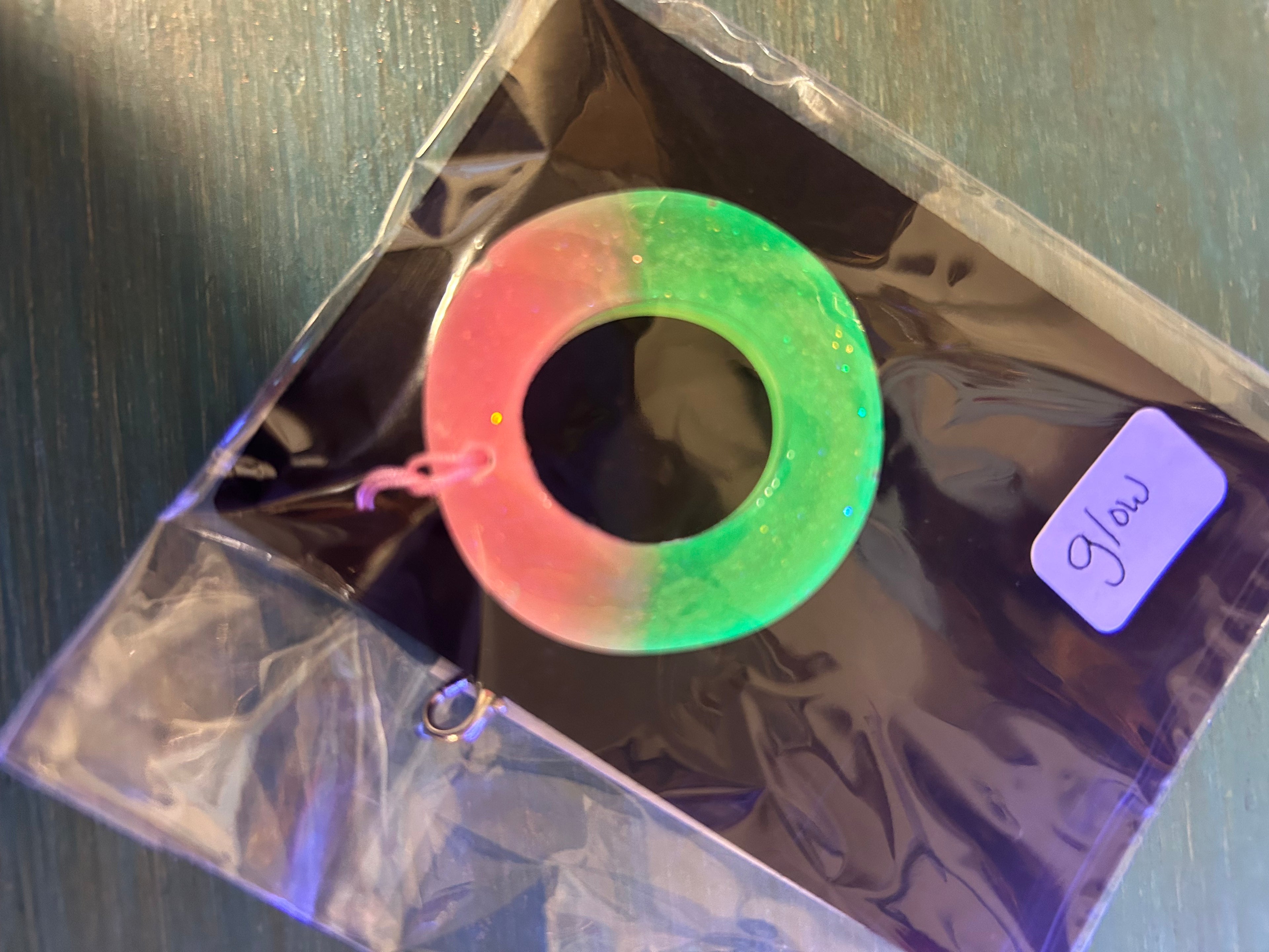 Letter charms/key chains/ bag clips (style color varies) some glow some don’t