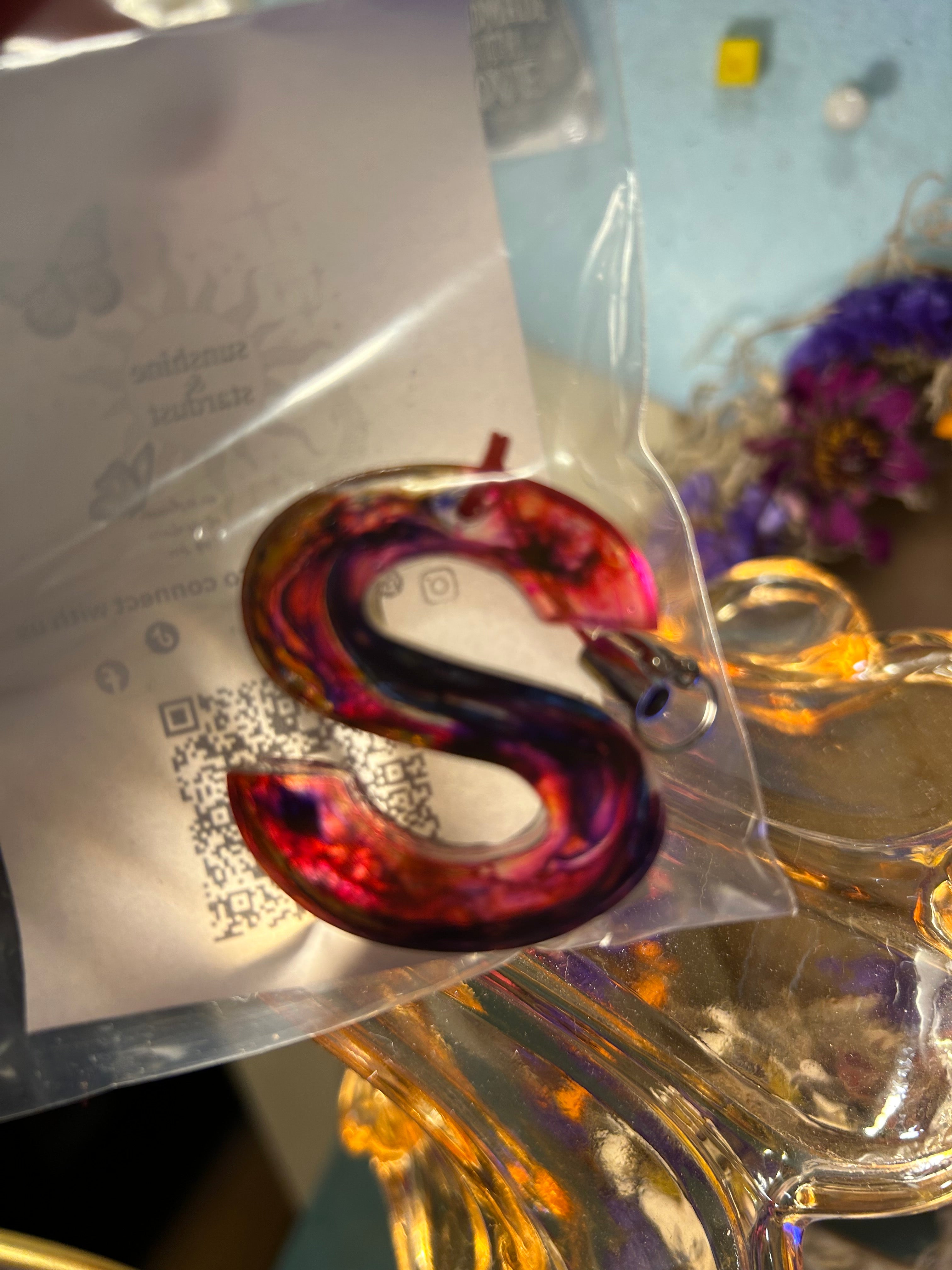 Letter charms/key chains/ bag clips (style color varies) some glow some don’t